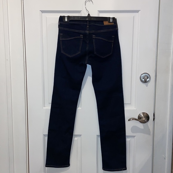 NWT. Express Dark Wash Mid Rise Skinny Strech Jeans. Size: 0/Petite. - Picture 6 of 7